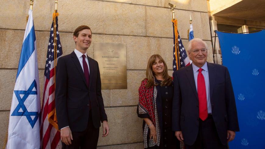 US Presidential Adviser Jared Kushner (L) poses with Ambassador David Friedman (R), and his wife Tammy (C), after the unveiling of a plaque at the embassy grounds in Jerusalem on December 21, 2020. (Photo by Maya Alleruzzo / POOL / AFP) (Photo by MAYA ALLERUZZO/POOL/AFP via Getty Images)
