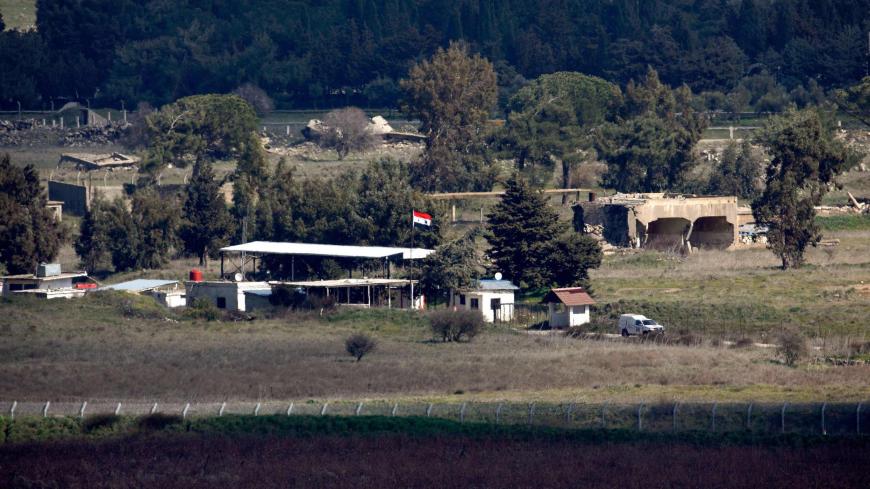This picture taken from the Israel-annexed Golan Heights on February 15, 2021, shows the border fence with the Syrian governorate of Quneitra (Photo by JALAA MAREY / AFP) (Photo by JALAA MAREY/AFP via Getty Images)