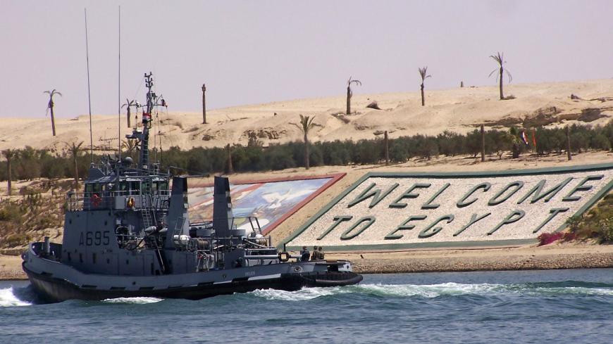 The ship French Navy Belier crosses the Suez canal off the coast of Ismailia port city, east of Cairo, on its way to the Mediterranean sea. AFP PHOTO        (Photo credit should read -/AFP via Getty Images)
