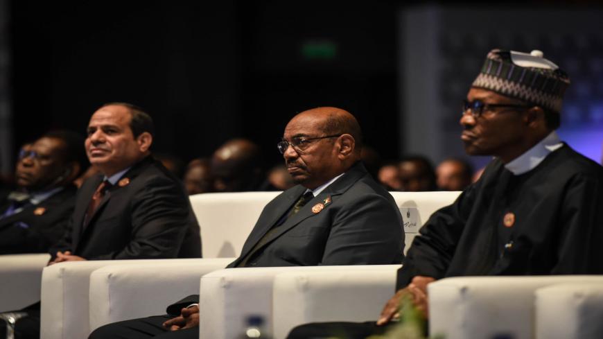 (From L to R) Egypt's President Abdel Fattah al-Sisi, Sudanese President Omar al-Bashir and Nigerian President Muhammadu Buhari attend the Africa 2016 forum on February 20, 2016, in the Red Sea resort of Sharm el-Sheikh.
More than 1,200 delegates including some heads of state will negotiate business agreements for the next two days at the Red Sea resort of Sharm el-Sheikh, to attract private sector investments in Africa. / AFP / MOHAMED EL-SHAHED        (Photo credit should read MOHAMED EL-SHAHED/AFP via Ge