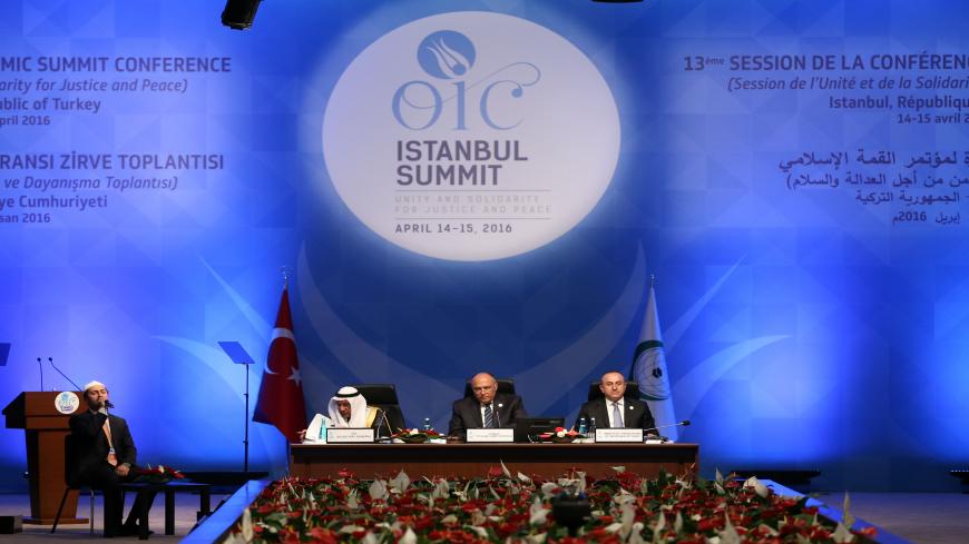 Secretary General of the Organization of Islamic Cooperation (OIC) Iyad bin Amin Madani (L), Foreign Ministers Sameh Shoukry of Egypt and Mevlut Cavusoglu of Turkey (R) attend the 13th Organization of Islamic Cooperation (OIC) Summit at Istanbul Congress Center (ICC) on April 14, 2016 in Istanbul. 
Turkish President Recep Tayyip Erdogan on Thursday hosts over 30 heads of state and government from Islamic countries in Istanbul for a major summit aimed at overcoming differences in the Muslim world.  / AFP / P