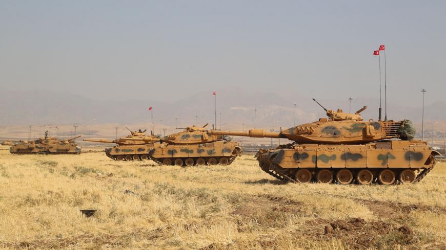 Turkish tanks are seen near the Habur crossing gate between Turkey and Iraq during a military drill on September 18, 2017.  
Turkey launched a military drill featuring tanks close to the Iraqi border the army said, a week before Iraq's Kurdish region will hold an independence referendum on September 25. / AFP PHOTO / STR        (Photo credit should read STR/AFP via Getty Images)