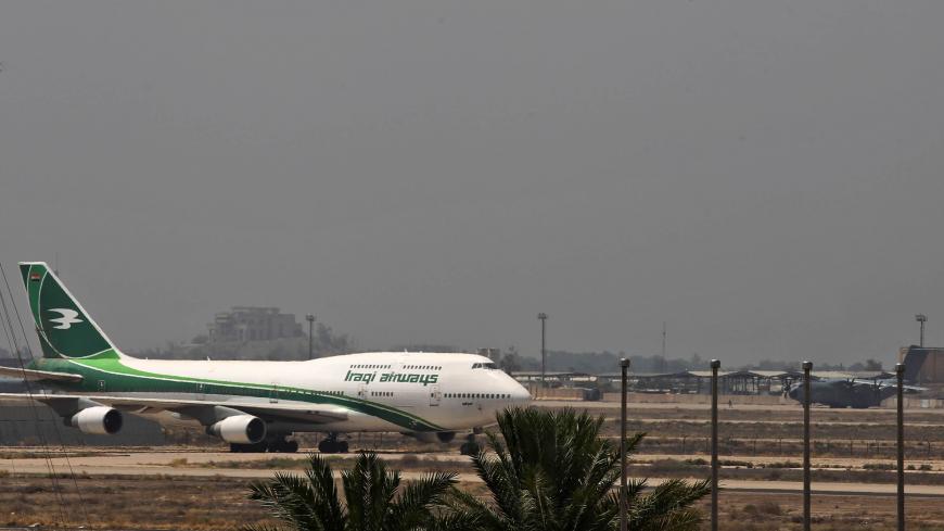 An Iraqi Airways Boeing 747 cargo aircraft is pictured on the tarmac of Baghdad's international airport following its reopening on July 23, 2020, after a closure since March forced by the coronavirus pandemic restrictions, aimed at preventing the spread of the deadly COVID-19 illness in Iraq. (Photo by AHMAD AL-RUBAYE / AFP) (Photo by AHMAD AL-RUBAYE/AFP via Getty Images)