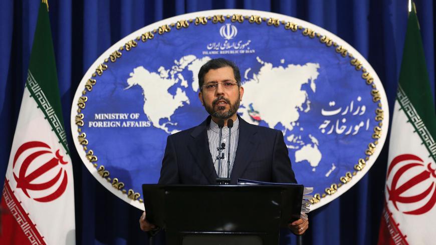 Iranian foreign ministry spokesman Saied Khatibzadeh gestures during a press conference in Tehran on February 22, 2021. - Iran hailed as a "significant achievement" a temporary agreement Tehran reached with the head of the UN nuclear watchdog on site inspections. That deal effectively bought time as the United States, European powers and Tehran try to salvage the 2015 nuclear agreement that has been on the brink of collapse since Donald Trump withdrew from it. (Photo by ATTA KENARE / AFP) (Photo by ATTA KEN