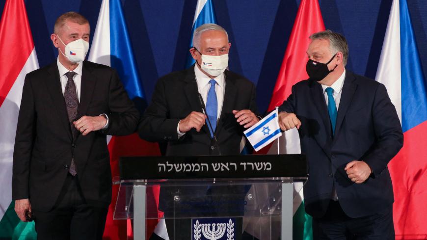 Prime Ministers of (L to R) Czech Republic Andrej Babis, Israel Benjamin Netanyahu, and Hungary Viktor Orban, bump elbows during a joint press conference in Jerusalem, on March 11, 2021. (Photo by ABIR SULTAN / POOL / AFP) (Photo by ABIR SULTAN/POOL/AFP via Getty Images)