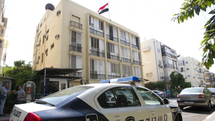 A Israeli police car is park in front of the Egyptian Embassy in the city of Tel Aviv on September 11, 2011, two days after Egyptian demonstrators went on the rampage in Cairo, breaking into the Israeli embassy and forcing the personnel to be evacuated. The trouble followed several weeks of protests outside the Israeli embassy in Cairo after 5 Egyptian border police were shot dead last month by the Israeli military during a search operation for militants who shot at an Israeli bus in Israel, close to their 