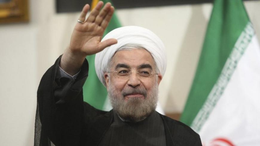 Iranian President-elect Hassan Rouhani gestures to the media during a news conference in Tehran June 17, 2013. REUTERS/Fars News/Majid Hagdost  (IRAN - Tags: POLITICS PROFILE) ATTENTION EDITORS - THIS IMAGE WAS PROVIDED BY A THIRD PARTY. FOR  EDITORIAL USE ONLY. NOT FOR SALE FOR MARKETING OR ADVERTISING CAMPAIGNS. THIS PICTURE IS DISTRIBUTED EXACTLY AS RECEIVED BY REUTERS, AS A SERVICE TO CLIENTS - RTX10QWD