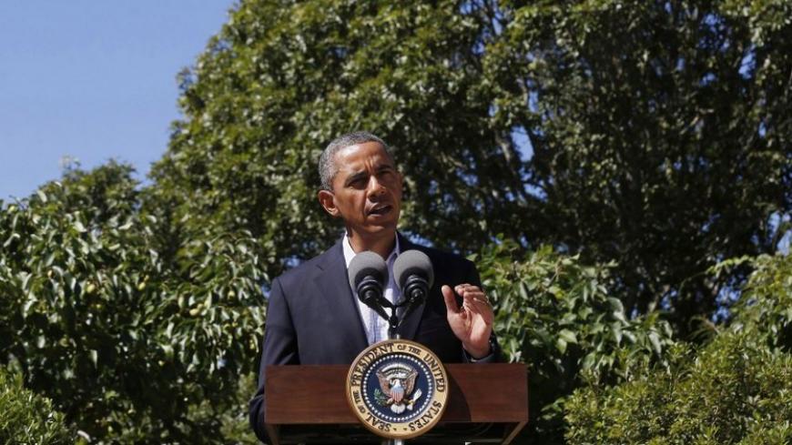 U.S. President Barack Obama makes a statement about the violence in Egypt while at his rental vacation home on the Massachusetts island of Martha's Vineyard in Chilmark August 15, 2013.      REUTERS/Larry Downing  (UNITED STATES - Tags: POLITICS) - RTX12MDG