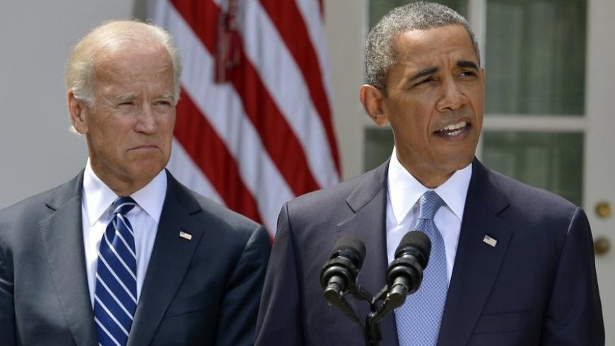 U.S. President Barack Obama speaks about Syria next to Vice President Joe Biden (L) at the Rose Garden of the White House August 31, 2013, in Washington. Obama said on Saturday he had decided the United States should strike Syrian government targets in response to a deadly chemical weapons attack, but said he would seek a congressional vote for any military action.        REUTERS/Mike Theiler (UNITED STATES - Tags: POLITICS) - RTX132WE