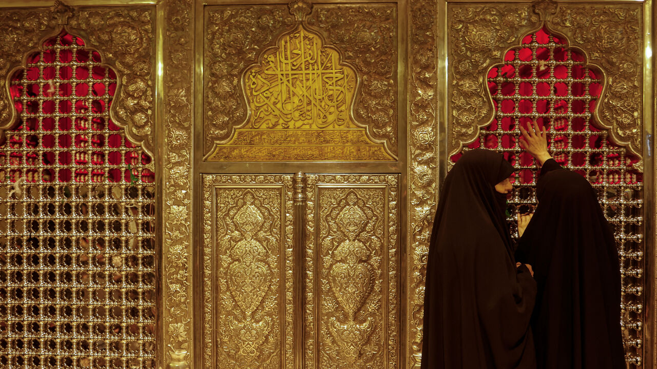 Shi'ite Muslim women visit the shrine of Athib Al-Yamani, known as Safi Safa, ahead of the Shi'ite holy ritual of Arbaeen, in Najaf, Iraq August 3, 2025. REUTERS/Alaa al-Marjani