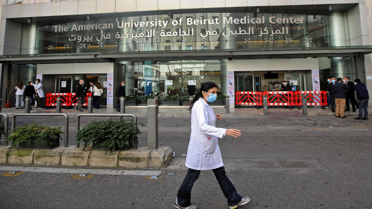 Medical staff are pictured outside the American University of Beirut Medical Center, Beirut, Lebanon, March 17, 2021. 