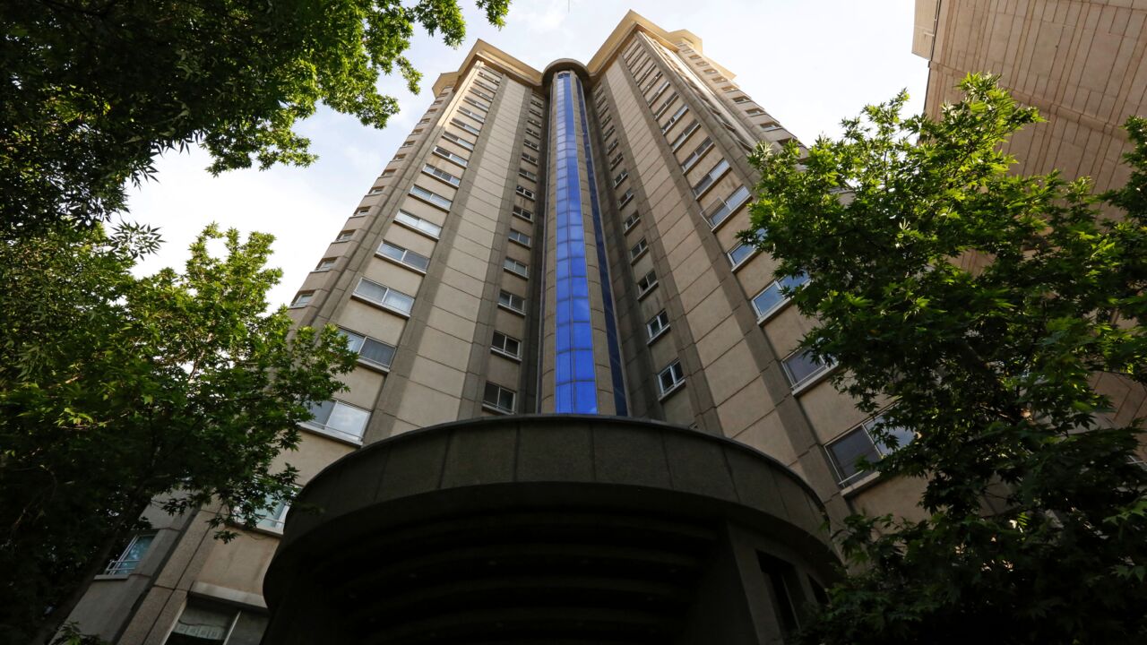 A general view shows the residence of a Swiss diplomat whose body was found at the entrance in the northern district of Tehran on May 4, 2021. A spokesman for the Iranian national rescue service said the body was found in the morning after the diplomat "fell from a (residential) tower in Kamranieh." In a message to AFP's Geneva office, Switzerland's Foreign Ministry confirmed that "a Swiss employee of the Swiss Embassy in Tehran died in a fatal incident." 
