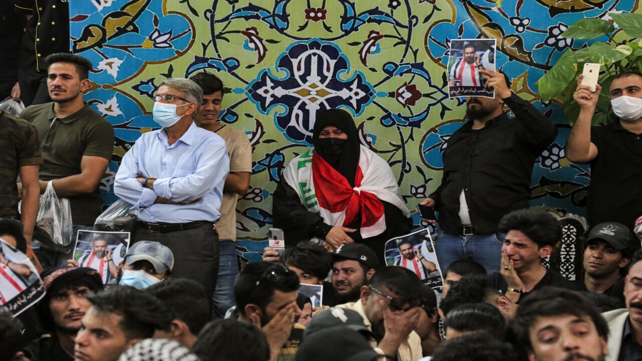 Mourners attend the funeral of assassinated Iraqi anti-government activist Ihab al-Wazni (Ehab al-Ouazni) at the Imam Hussein Shrine in the central holy shrine city of Karbala on May 9, 2021. Wazni, a coordinator of protests in the Shiite shrine city of Karbala, was a vocal opponent of corruption, the stranglehold of Tehran-linked armed groups and Iran's influence in Iraq. He was shot overnight outside his home by men on motorbikes, in an ambush caught on surveillance cameras.