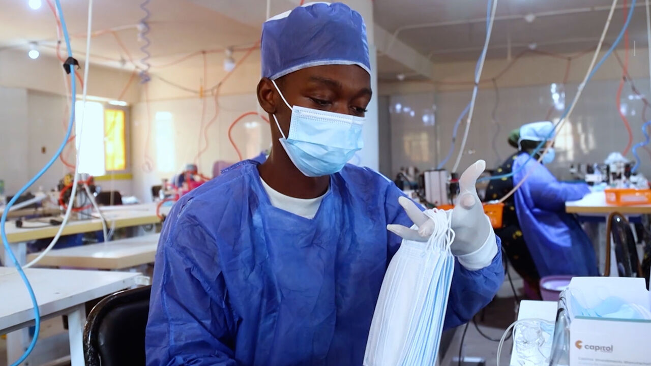 Workers at Al Capitol factory.
