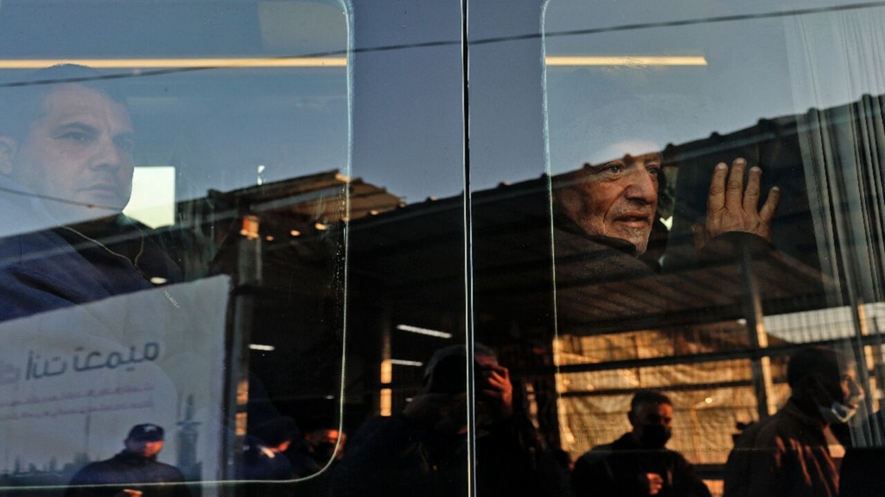 Palestinian workers in a minivan as they leave Beit Hanun in the northern Gaza Strip for the Erez crossing into Israel