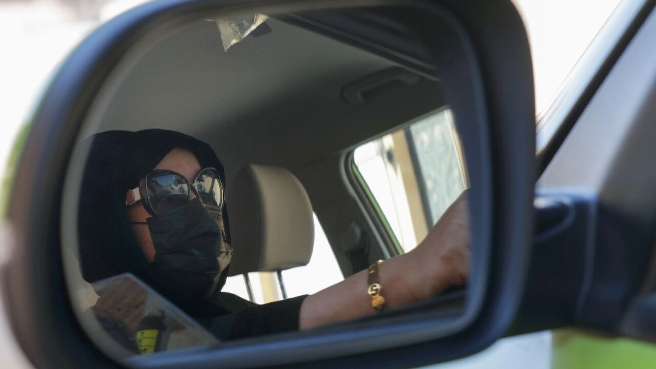 Fahda Fahd picks up fares in the Saudi capital Riyadh from a ride-hailing app exclusively for women, as a way of earning extra cash amid rising living costs in the kingdom