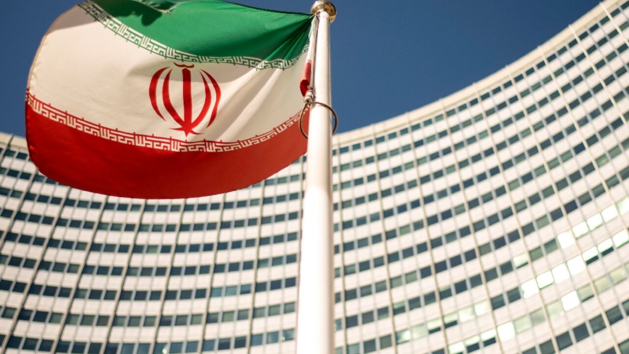 Iran's flag flutters outside the headquarters of the UN nuclear watchdog in Vienna, Austria