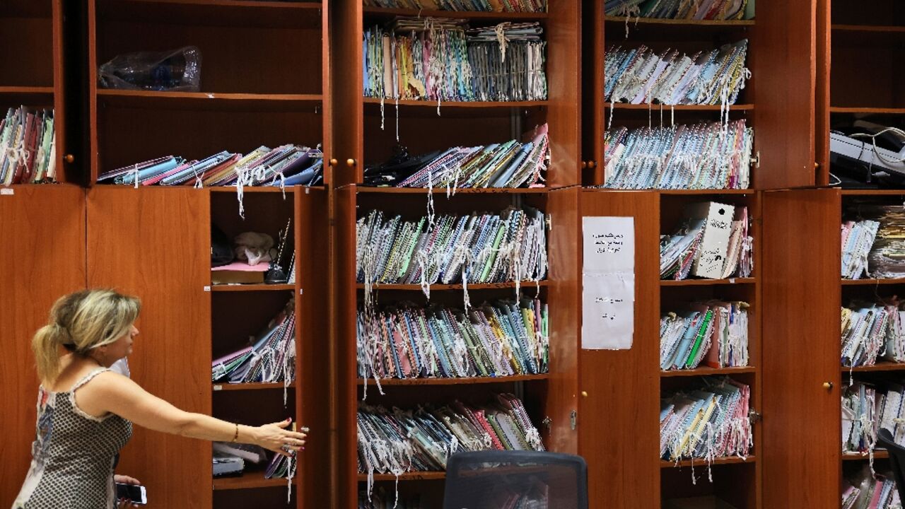 Piled files await being processed in Lebanon's Justice Palace in Beirut, in a picture from August 30, 2022