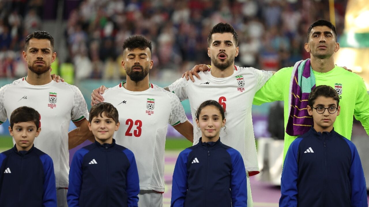 Iranian players during the playing of their national anthem ahead of the clash with the US on Tuesday night