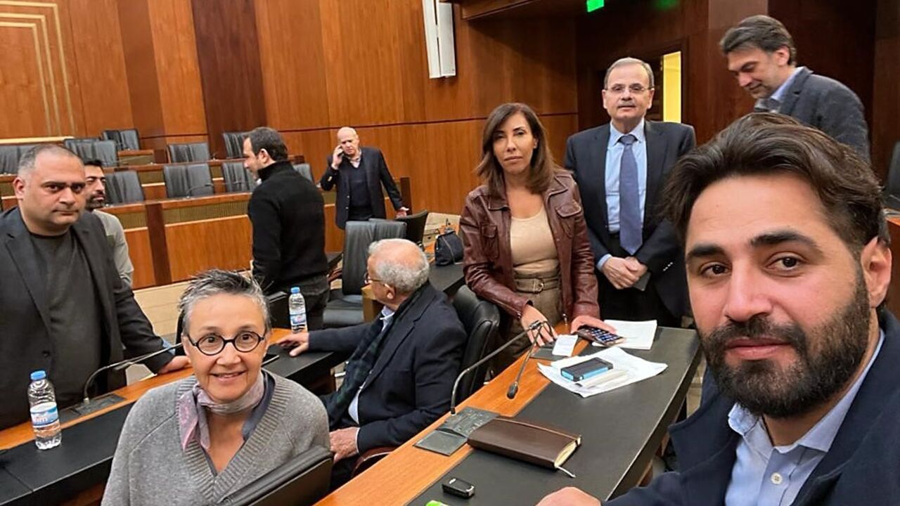 Independent Lebanese lawmakers Najat Saliba (front L) and Melhem Khalaf (back 3rd L) during a sit-in at the parliament in Beirut