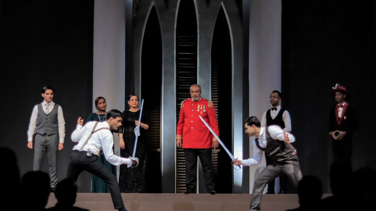 Actors perform in a production of William Shakespeare's 'Hamlet', in war-torn Yemen's southern city of Aden