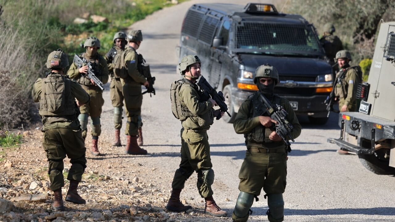 Israeli security forces close off the area northwest of Ramallah in the occupied West Bank