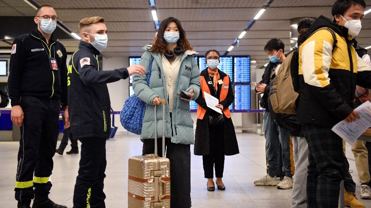 Around a dozen countries have slapped fresh travel rules on travellers from China