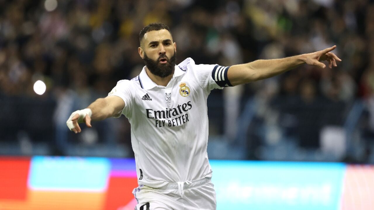 Real Madrid's French forward Karim Benzema celebrates scoring during the Spanish Super Cup semi-final against Valencia in Riyadh, Saudi Arabia