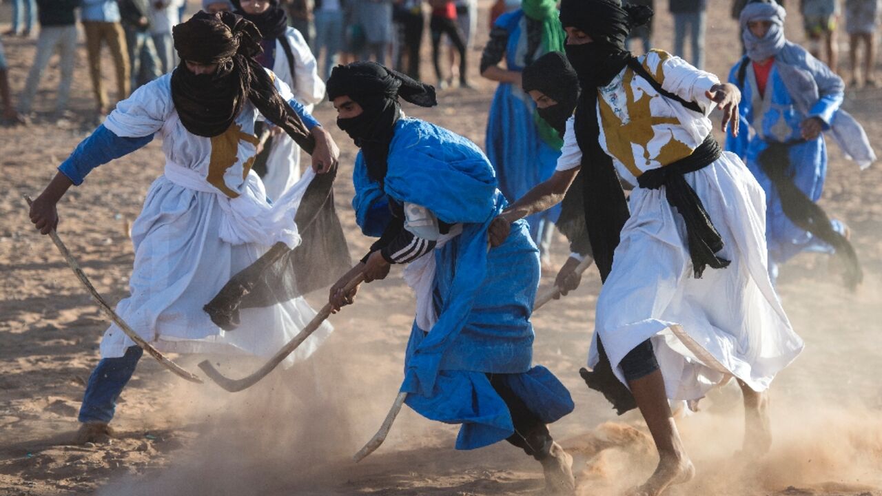 Sand hockey is similar in many ways to field and ice hockey, but played barefoot and with palm wood sticks