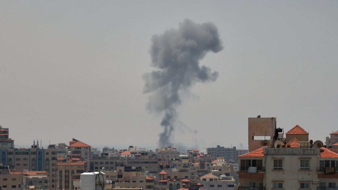 Smoke billows over the Gaza Strip as the Israeli military says it has renewed air strikes against Islamic Jihad targets in the territory