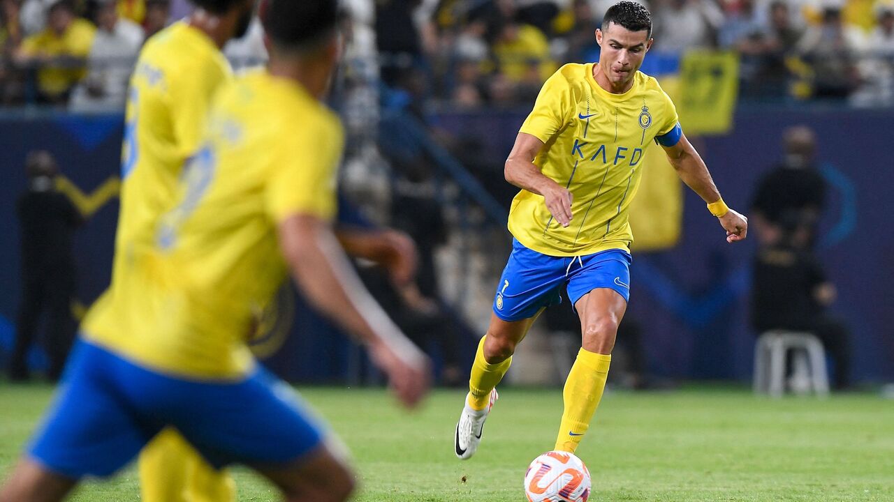 Nassr's Portuguese forward #07 Cristiano Ronaldo shoots during the AFC Champions League playoff football match between Saudi's Al-Nassr and UAE's Shabab Al-Ahli at the King Saud University Stadium in Riyadh on August 22, 2023. (Photo by Yazid al-Duwihi / AFP) (Photo by YAZID AL-DUWIHI/AFP via Getty Images)