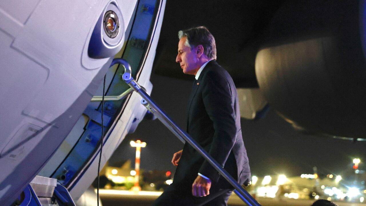 US Secretary of State Antony Blinken boards an aircraft as he departs Israel from Tel Aviv en route to Jordan, amid the ongoing conflict between Israel and the Palestinian Islamist group Hamas on November 3, 2023