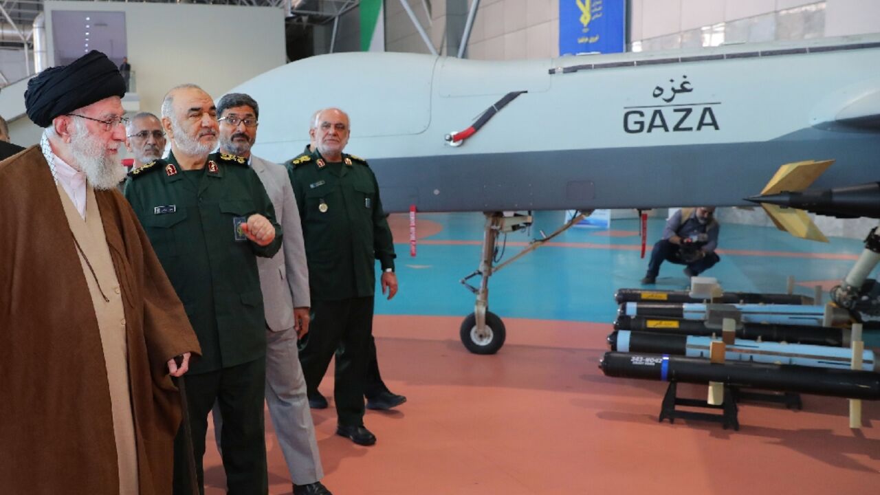 Iran's Supreme Leader Ayatollah Ali Khamenei (L) during a visit to a Revolutionary Guards centre in Tehran