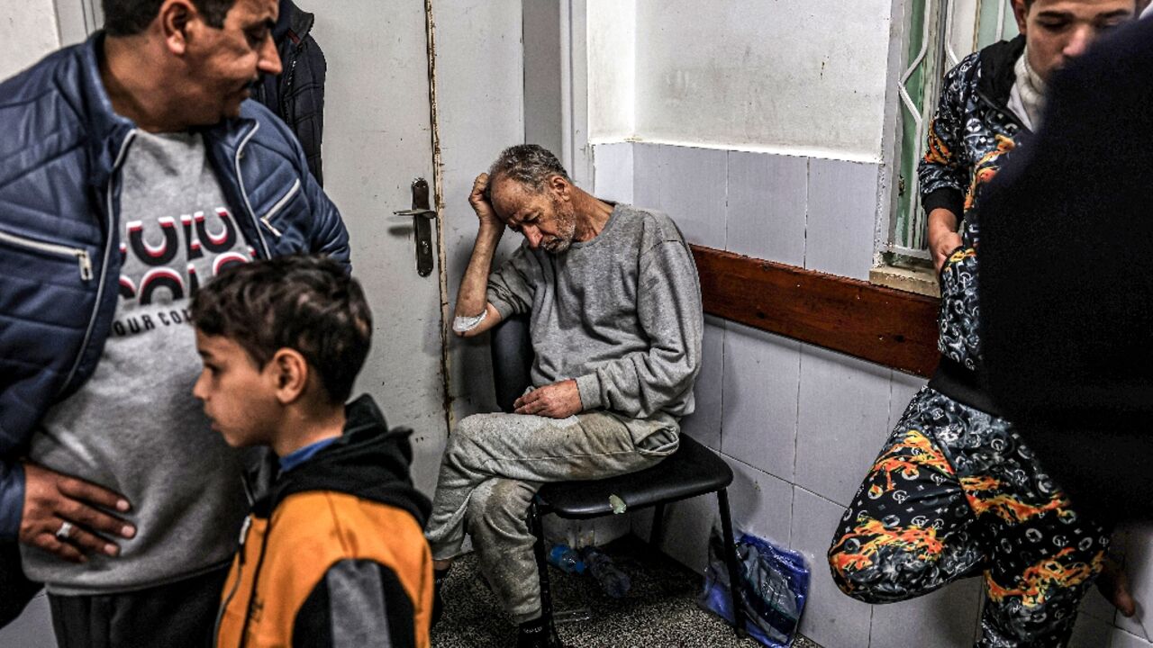 A Palestinian man, released after detention by Israeli forces in Gaza, awaits treatment at al-Najjar hospital in Rafah