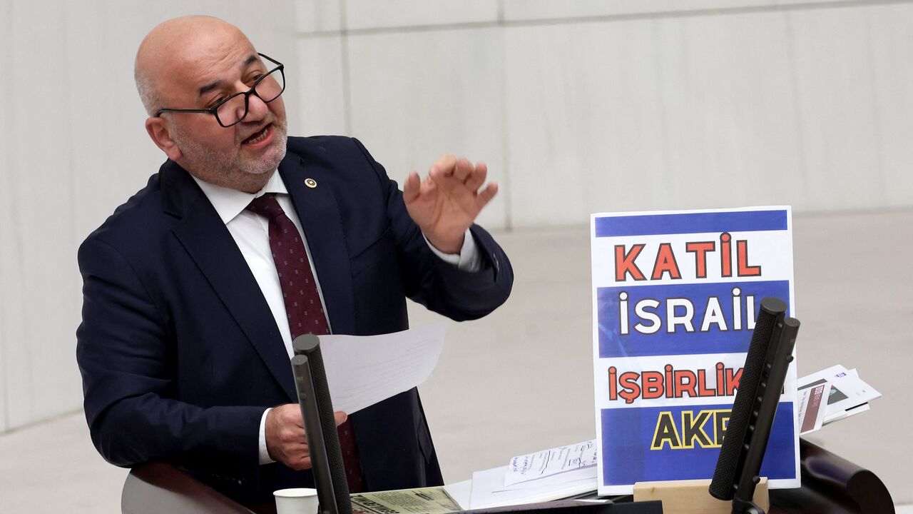 Saadet (Felicity) Party deputy Hasan Bitmez delivers a speech shortly before collapsing at the podium in the Turkish Grand National Assembly, Ankara, Dec. 12, 2023.