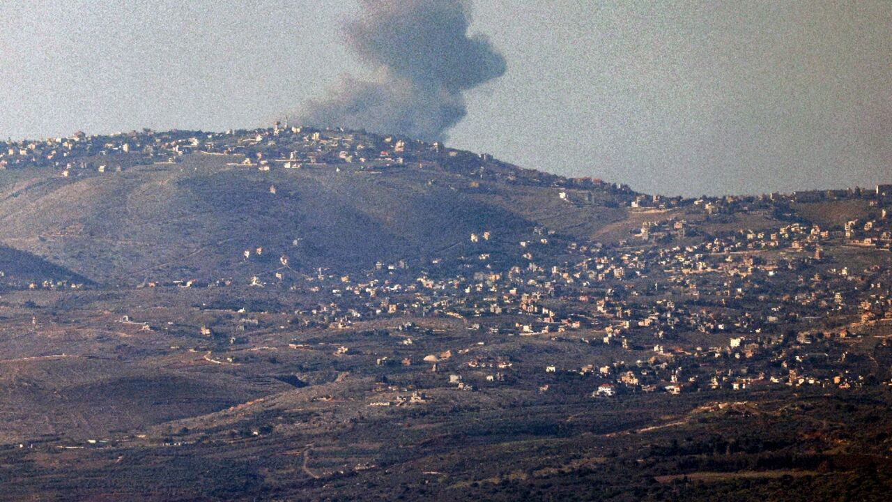 Smoke billows along hills in southern Lebanon after Israeli bombardment from a position along the border in northern Israel