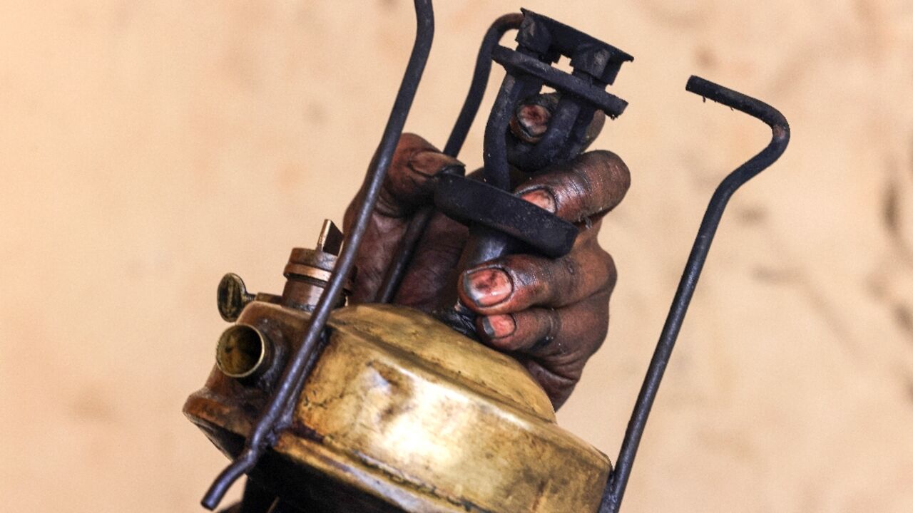 Old brass stoves are getting a new makeover in the besieged Gaza Strip as civilians displaced by Israel's war on Hamas hope and deprived of gas hope to fire them up for cooking