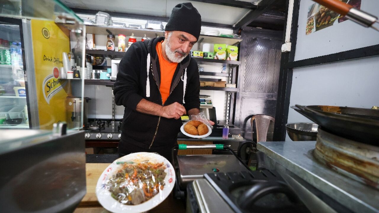 Hafeth Ghazawneh says his income has plummeted from around 7,000 shekels ($1,850) per month to just 2,000 ($530). His worsening situation reflects the current status of the West Bank economy, which is in tatters as the war in Gaza rages