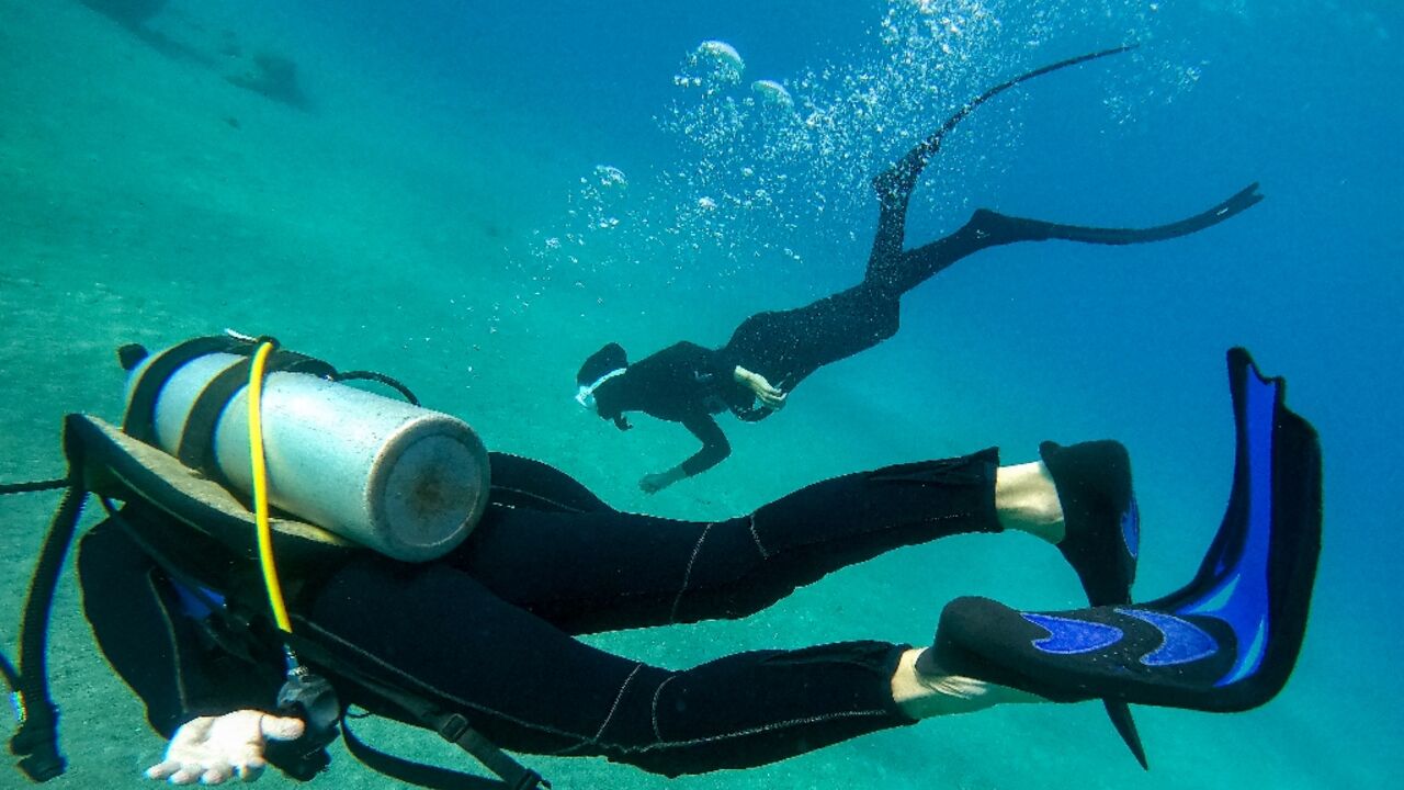 Yamit Avital and her husband Benny, survivors of the October 7 Hamas attacks, have found solace in diving