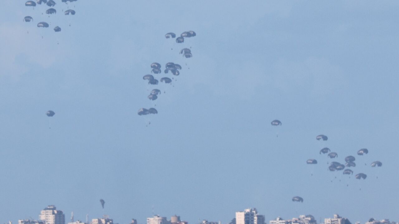 The pallets of humanitarian aid being airdropped into northern Gaza