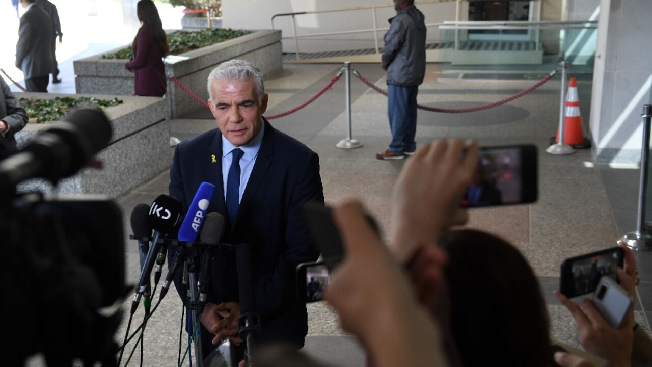 Israeli opposition leader Yair Lapid speaks to reporters after meeting with US Secretary of State Antony Blinken at the State Department 