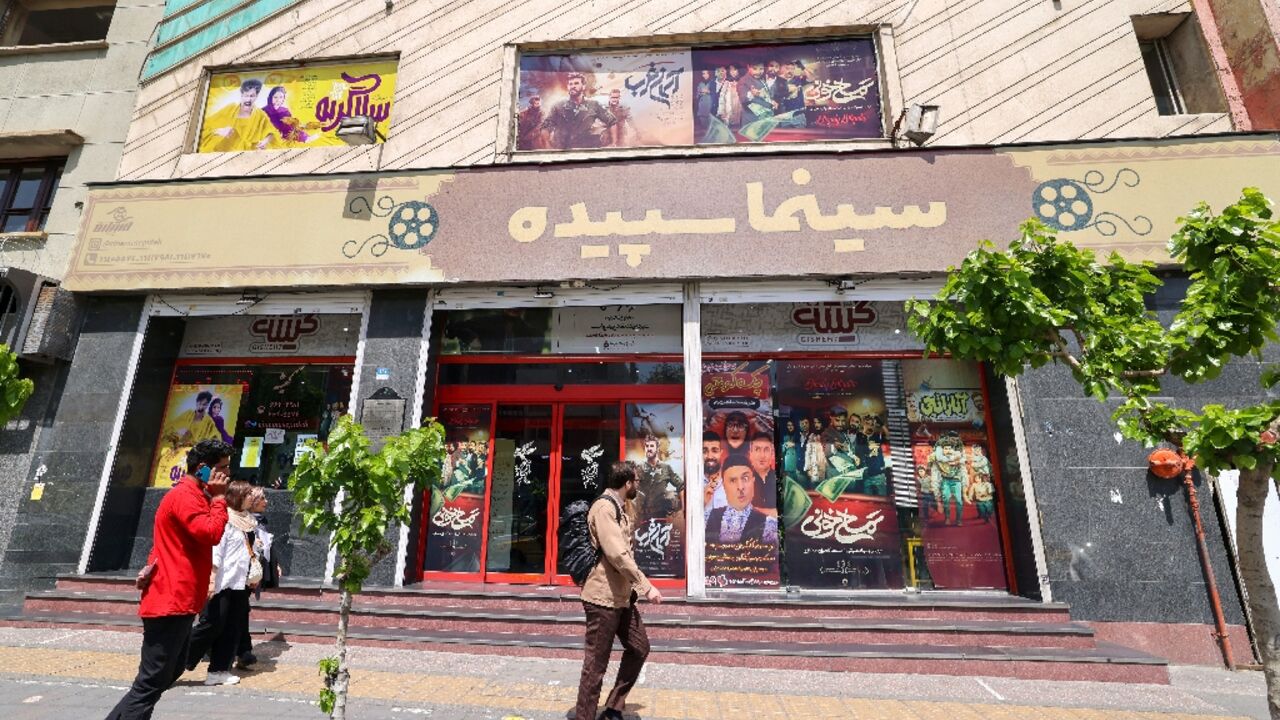 'We need to laugh because the social economic situation is difficult,' said 47-year-old trader Milad