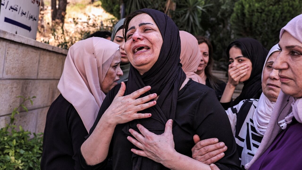 The mother of Ahmad Ramzi Sultan mourns her son