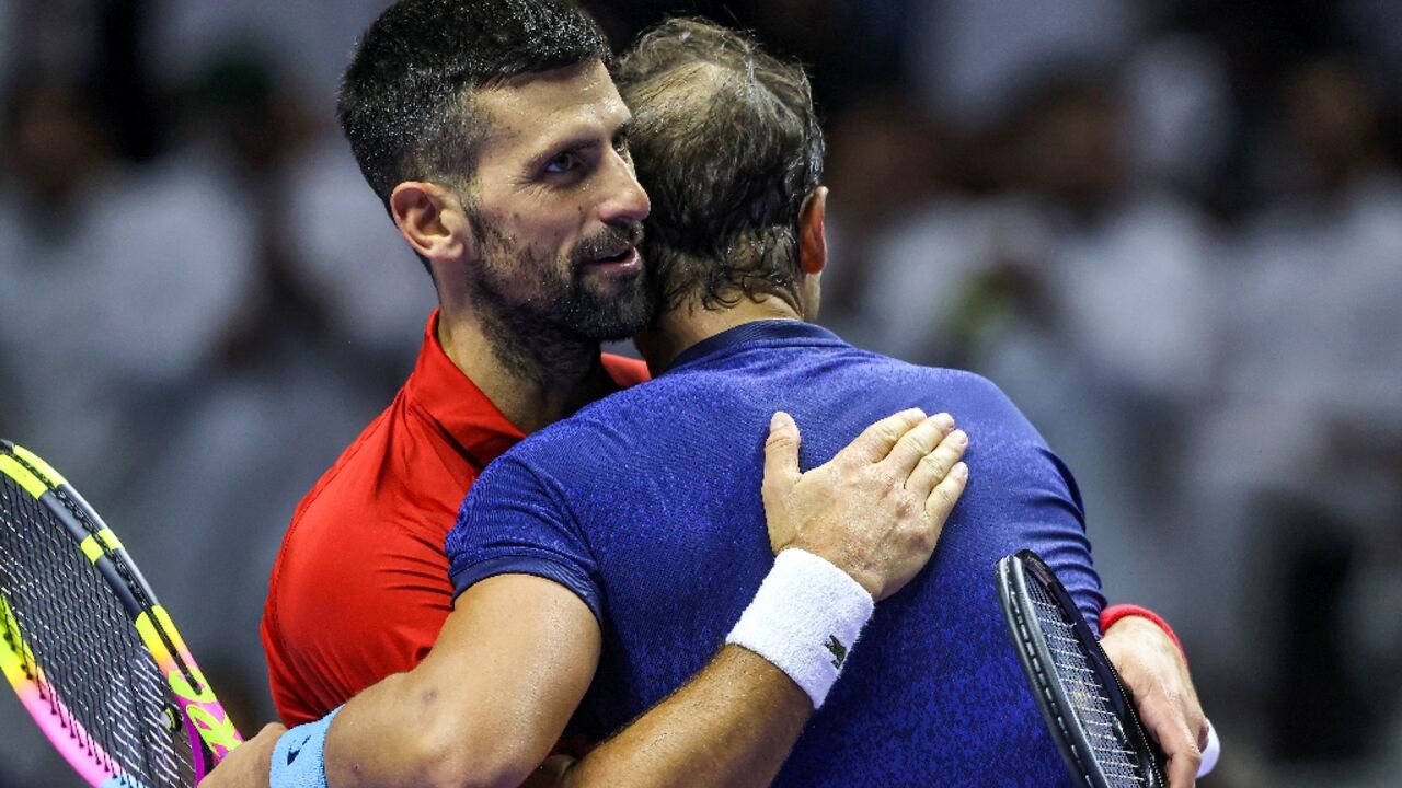 'Don't leave, man': Novak Djokovic and Rafael Nadal embrace after their match 