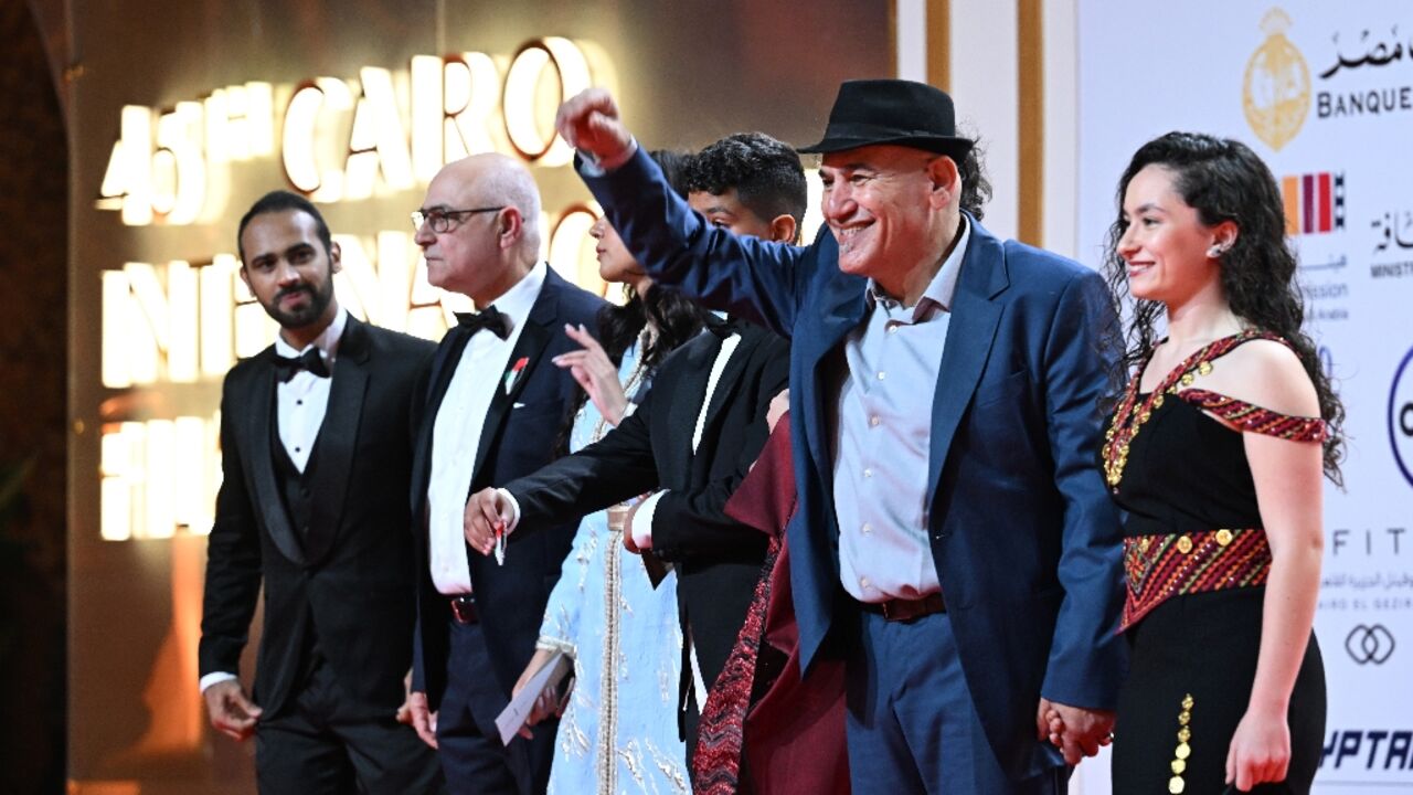 Palestinian director Rashid Masharawi (2nd R) presented his film 'Passing Dreams' at the Cairo International Film Festival this week