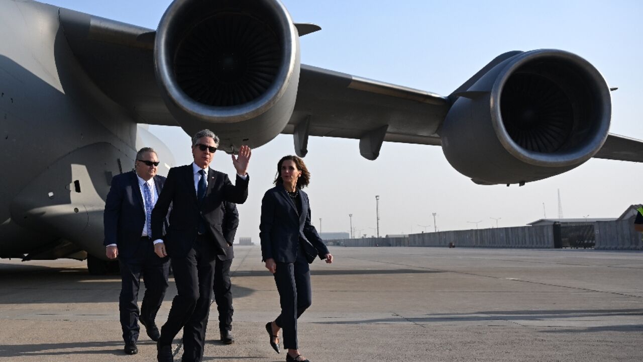 US Secretary of State Antony Blinken is welcomed by US officials upon landing in Baghdad, during his regional tour focused on Syria