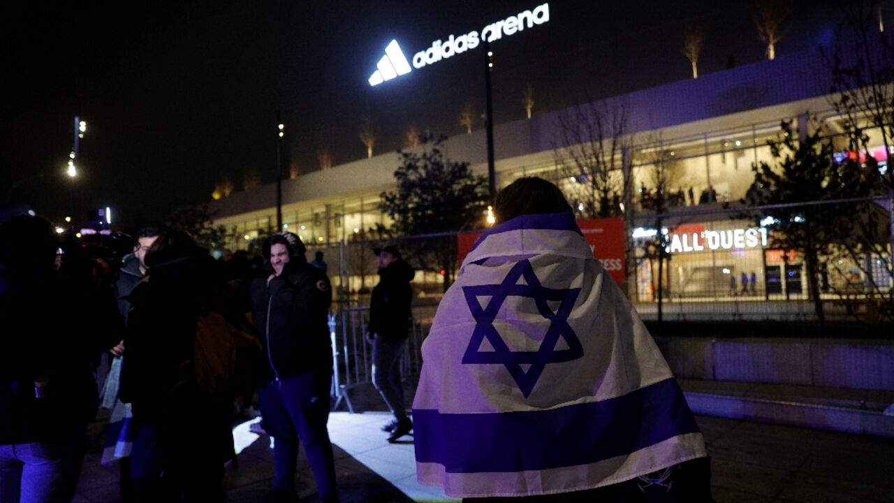 Despite the tight security, there were no reports of trouble at the match played at l'Arena Porte de la Chapelle in the north of the French capital