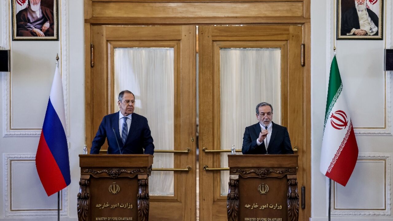 Iran's Foreign Minister Abbas Araghchi (R) ruled out direct nuclear talks with the US during a visit by his Russian counterpart Sergei Lavrov