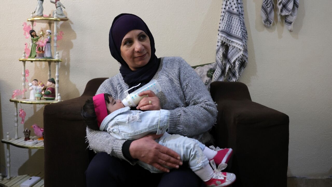 Iman Farhat said the idea for her and her husband to adopt a child 'was cemented by' Gaza's war