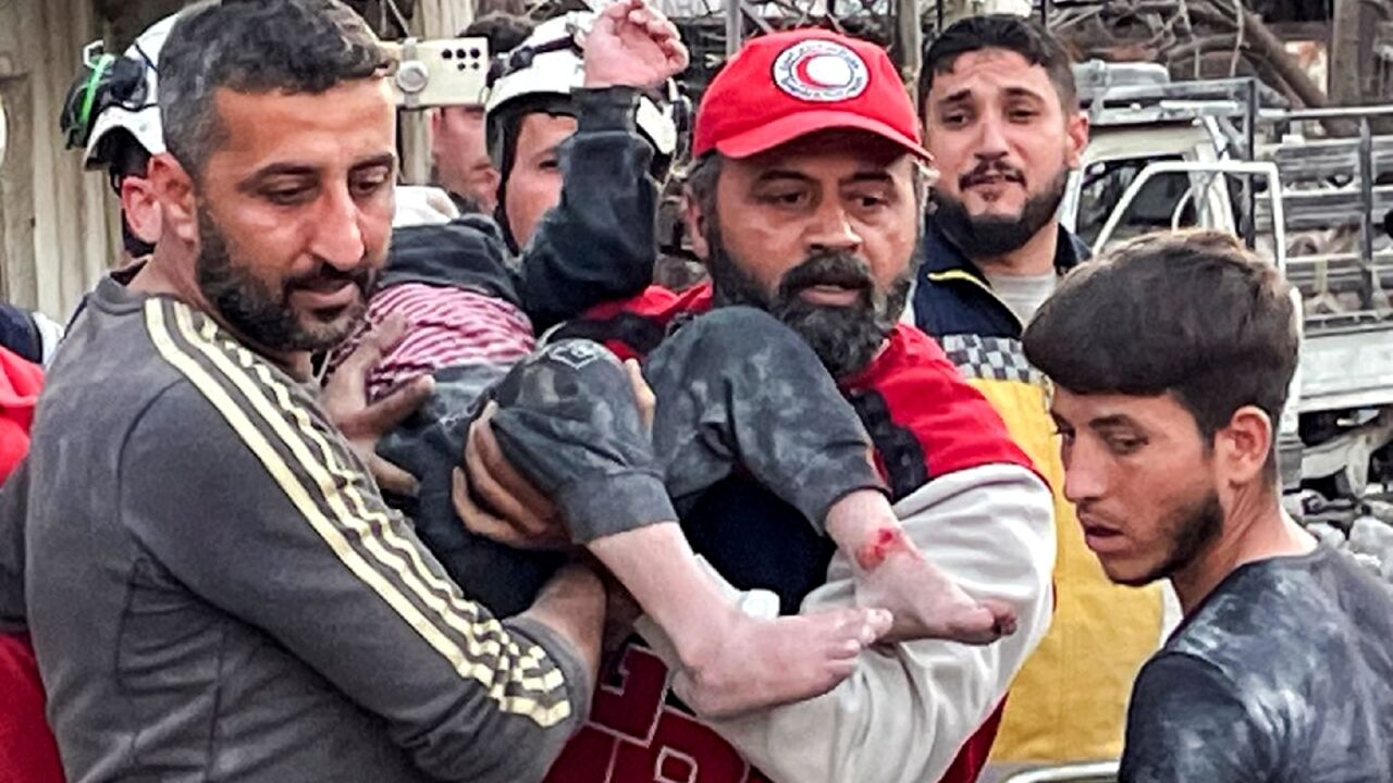 Rescue workers dug out people trapped after a building collapsed in an explosion 